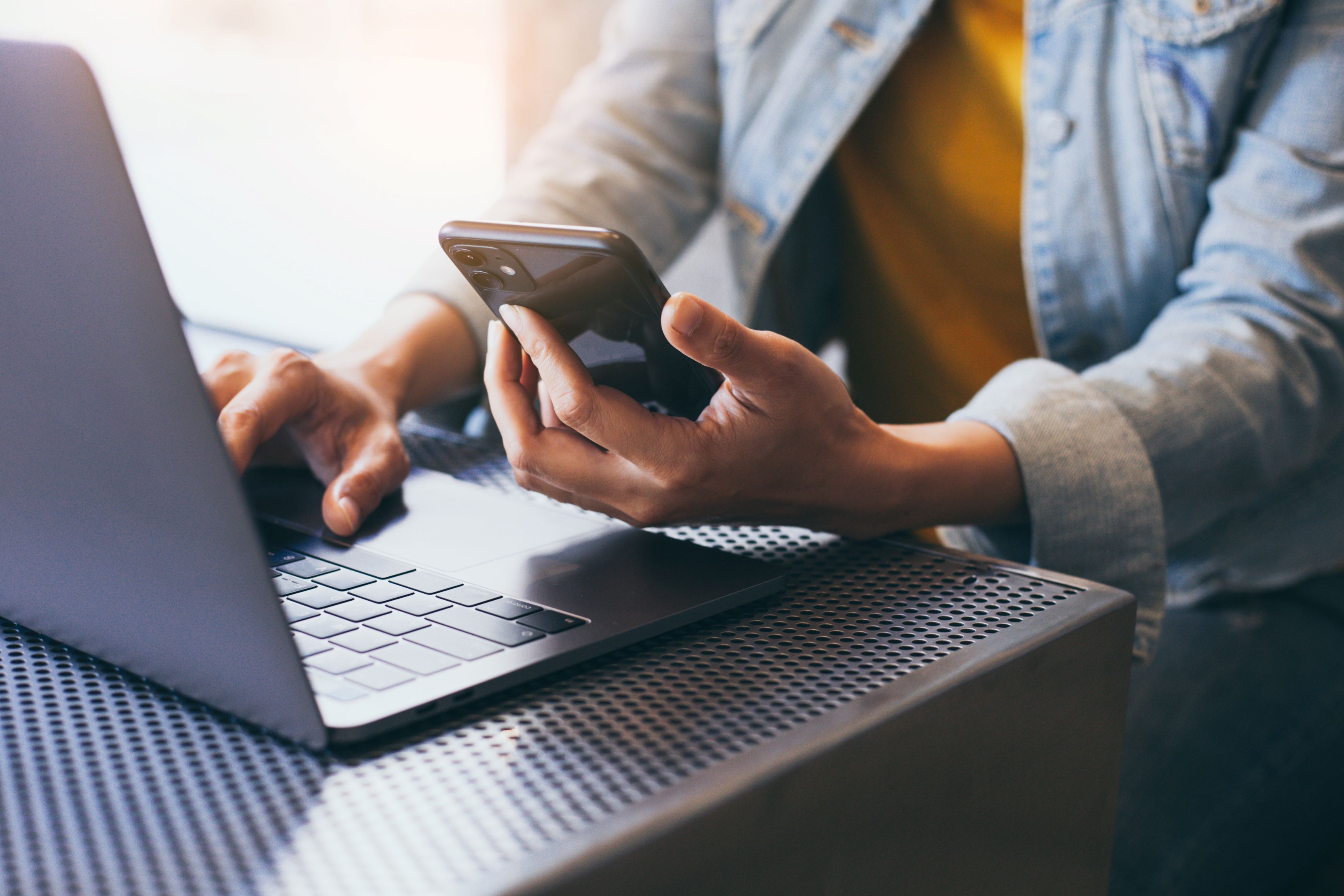 work using texting cell phone typing computer.chatting on mobile